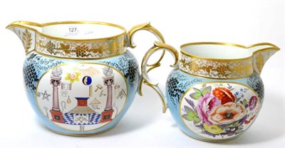Lot 127 - A graduated pair of Staffordshire porcelain jugs, dated 1816, decorated with Masonic emblems,...