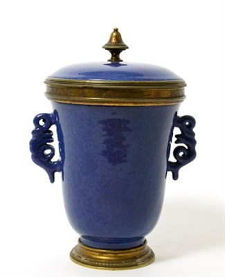 Lot 148 - A Chinese gilt metal mounted powder blue twin-handled beaker and cover, 20cm high