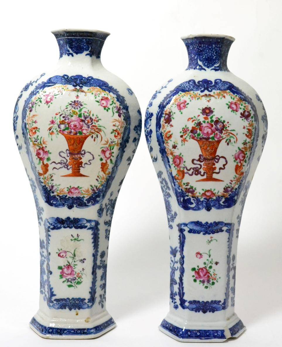 Lot 149 - A pair of Chinese porcelain hexagonal baluster vases, Qianlong, painted in famille rose enamels and