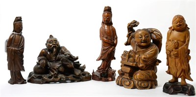 Lot 161 - A Chinese rootwood figure of a fisherman, 20cm high; and four various Chinese carved wood...