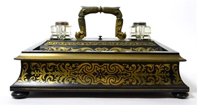 Lot 167 - A mid 19th century brass mounted and inlaid ebonised wood inkstand, with central handle flanked...