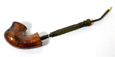 Lot 205 - A 19th century pipe with large birch briar bowl, 45cm long