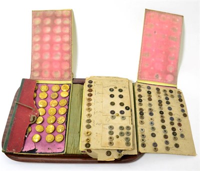 Lot 206 - A 19th century travellers sample set of buttons, in red and green leather cloth fitted case and...