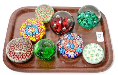 Lot 222 - A 20th century millifiori paperweight, 8cm diameter; and seven other paperweights (8)...