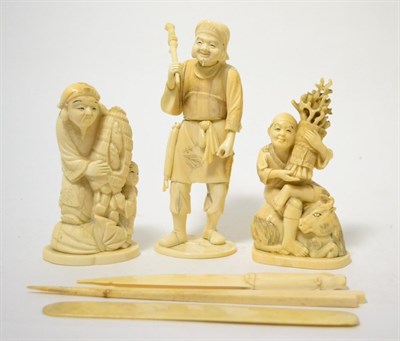 Lot 229 - A Japanese ivory okimono, Meiji, as a woodsman sitting on a goat, 13cm high; a similar figure...